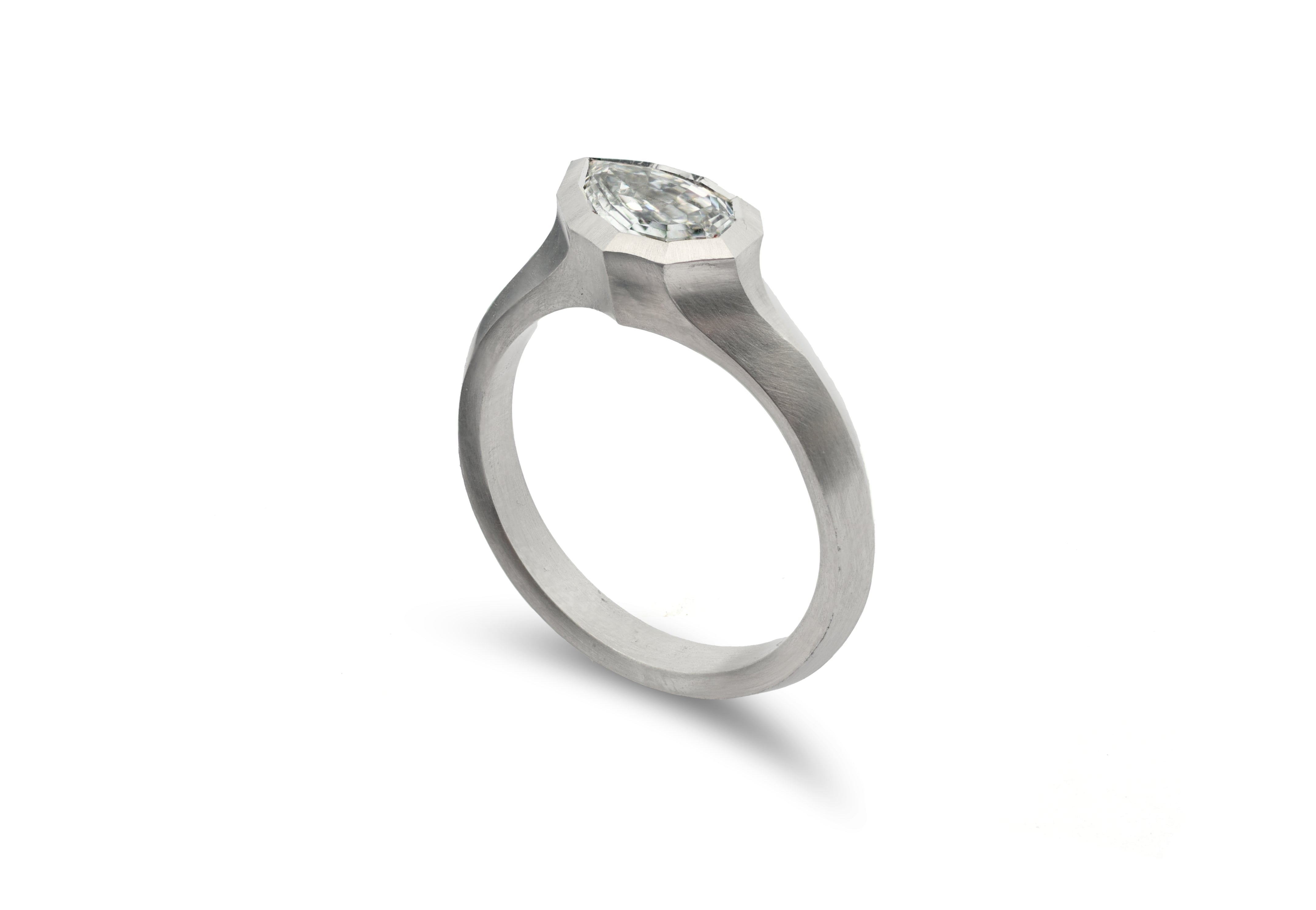 Platinum Pear Shaped Diamond Faceted Arris Ring