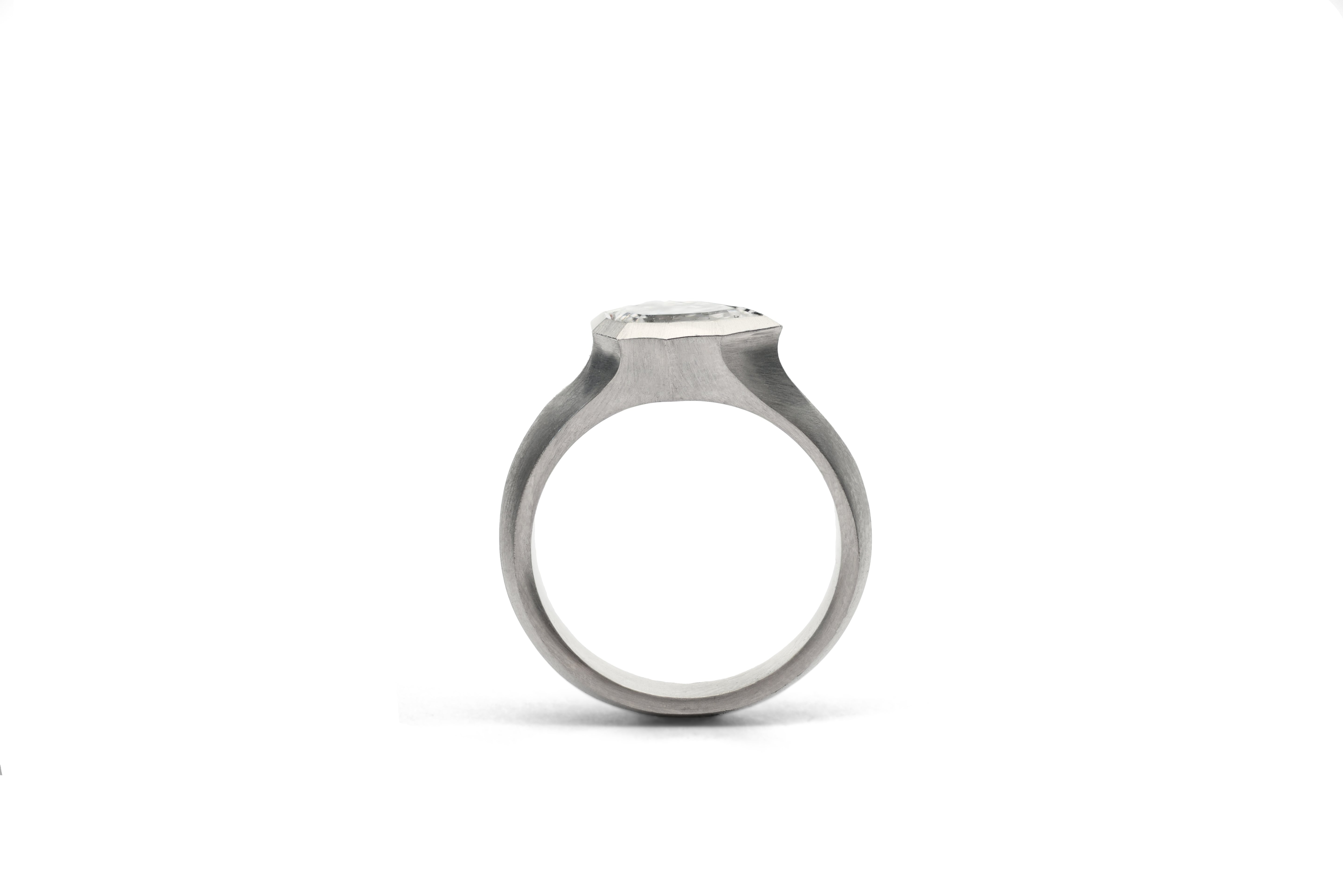Platinum Pear Shaped Diamond Faceted Arris Ring