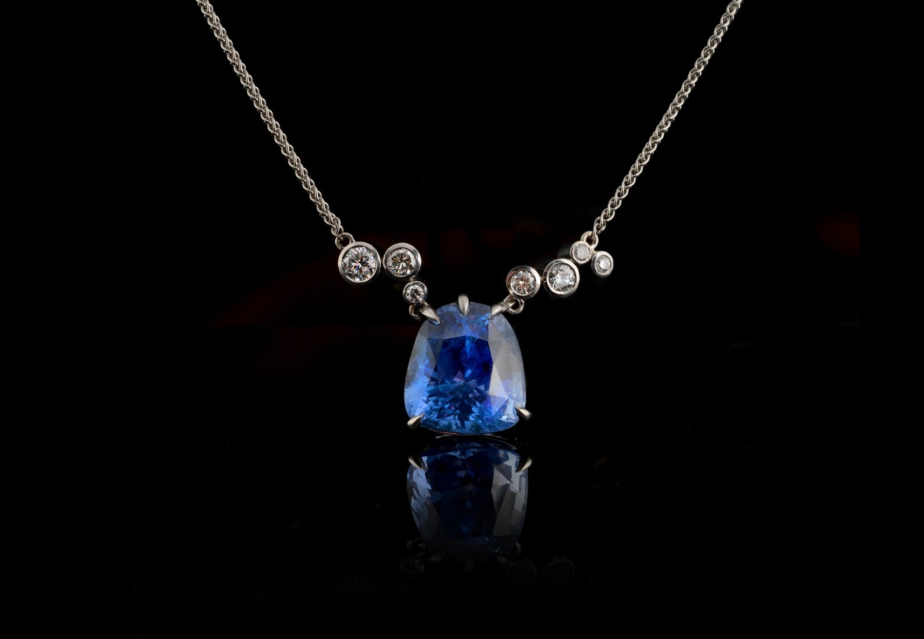 Sapphire and white diamond platinum pendant