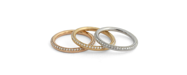 McCaul Goldsmith platinum and 18ct yellow and rose gold Eternity Bands with pavé set diamonds