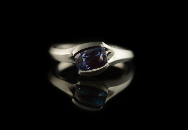 Carved platinum and colour changing alexandrite engagement ring commission