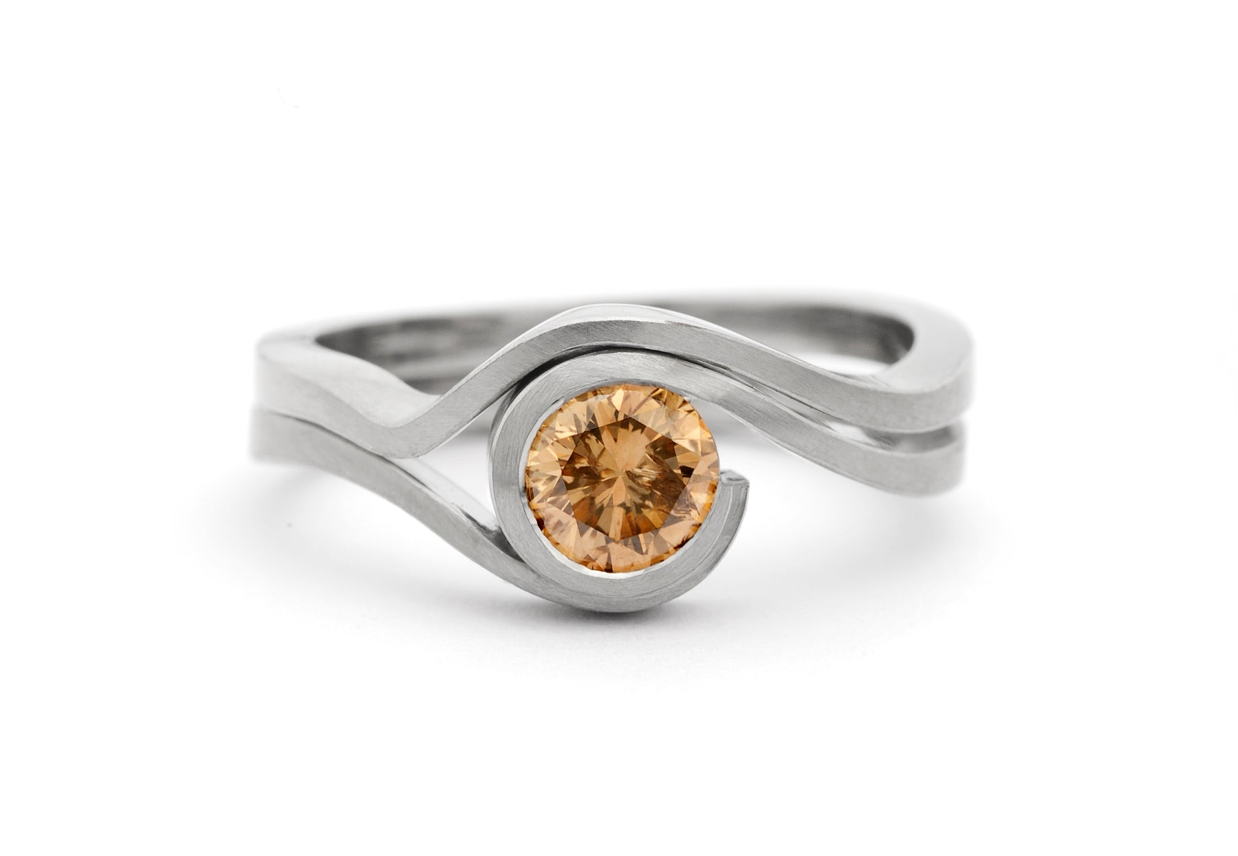 Wave cognac diamond and platinum engagement ring and fitted wedding ring
