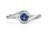 Platinum and blue sapphire Wave engagement ring