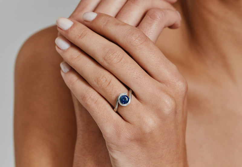 Platinum and blue sapphire Wave engagement ring-McCaul